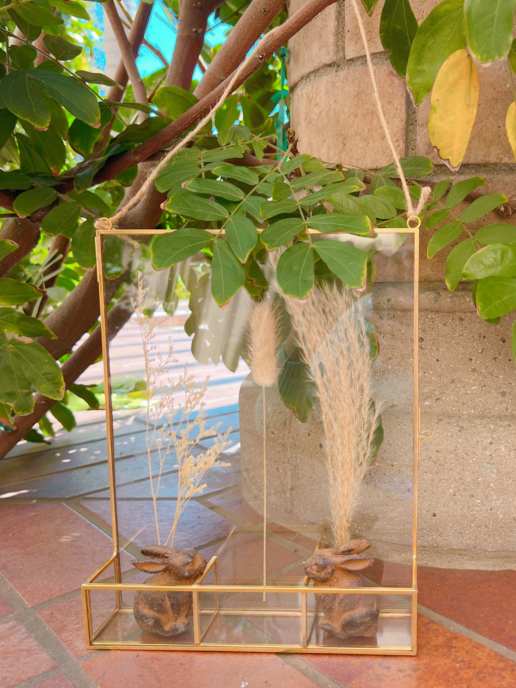 Gold-Edged Glass Frame Display with Compartment Cases